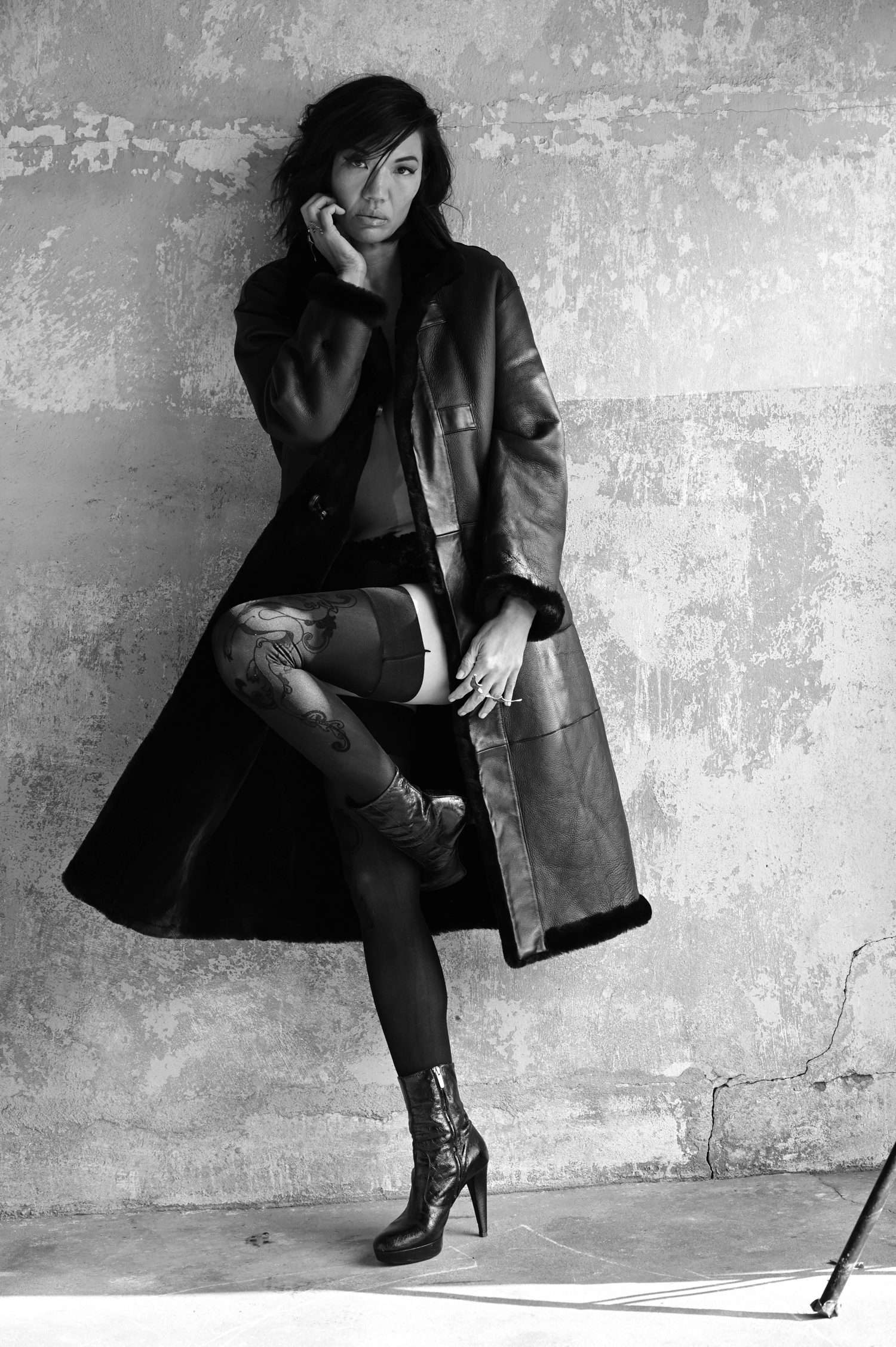Shannon Shiang in a leather and shearling coat by Aelse