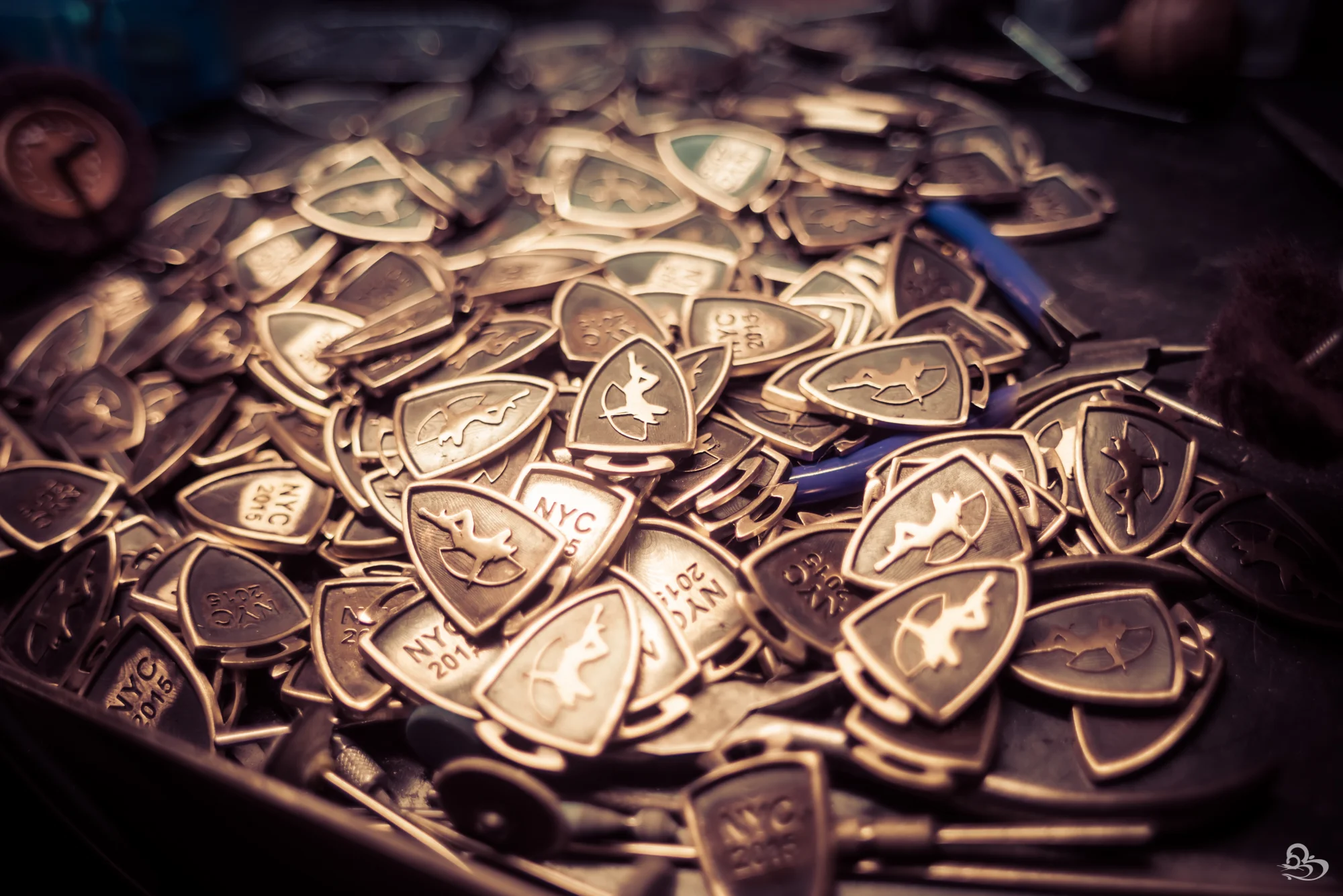 Bronze shield pendants Shannon Shiang made for the Robin Hood Foundation, NYC 2015